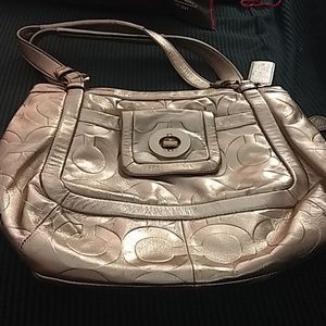 Coach metallic signature in rose gold